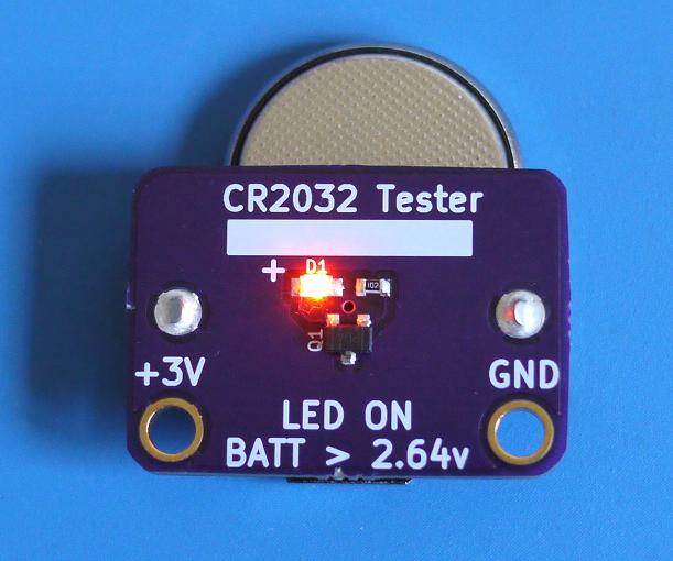 Coin cell tester with a battery inserted